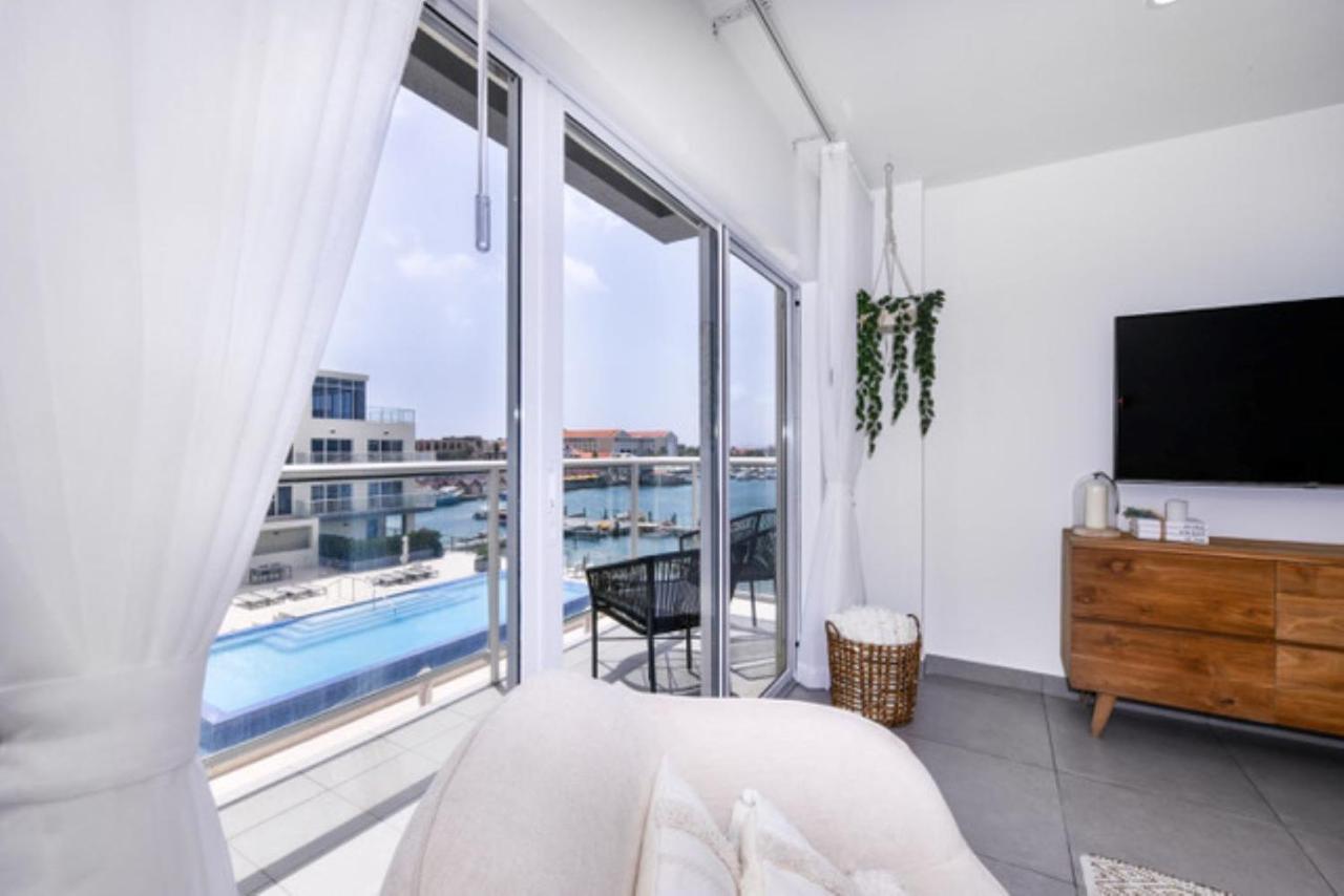 Stylish Luxury Condo, Central Location, Ocean View, Pool, Gym اورانجستاد المظهر الخارجي الصورة